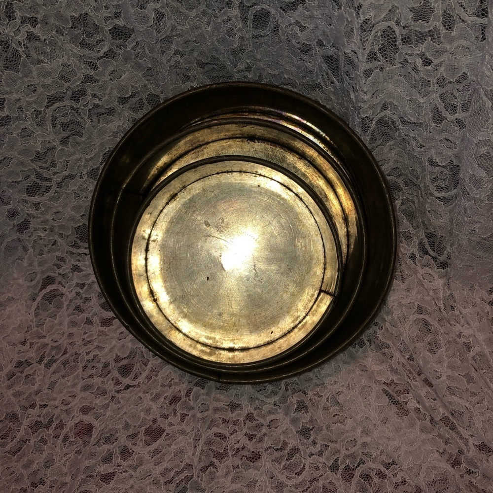Three round vintage fruitcake/ wedding cake baking tins with removable bottoms.
